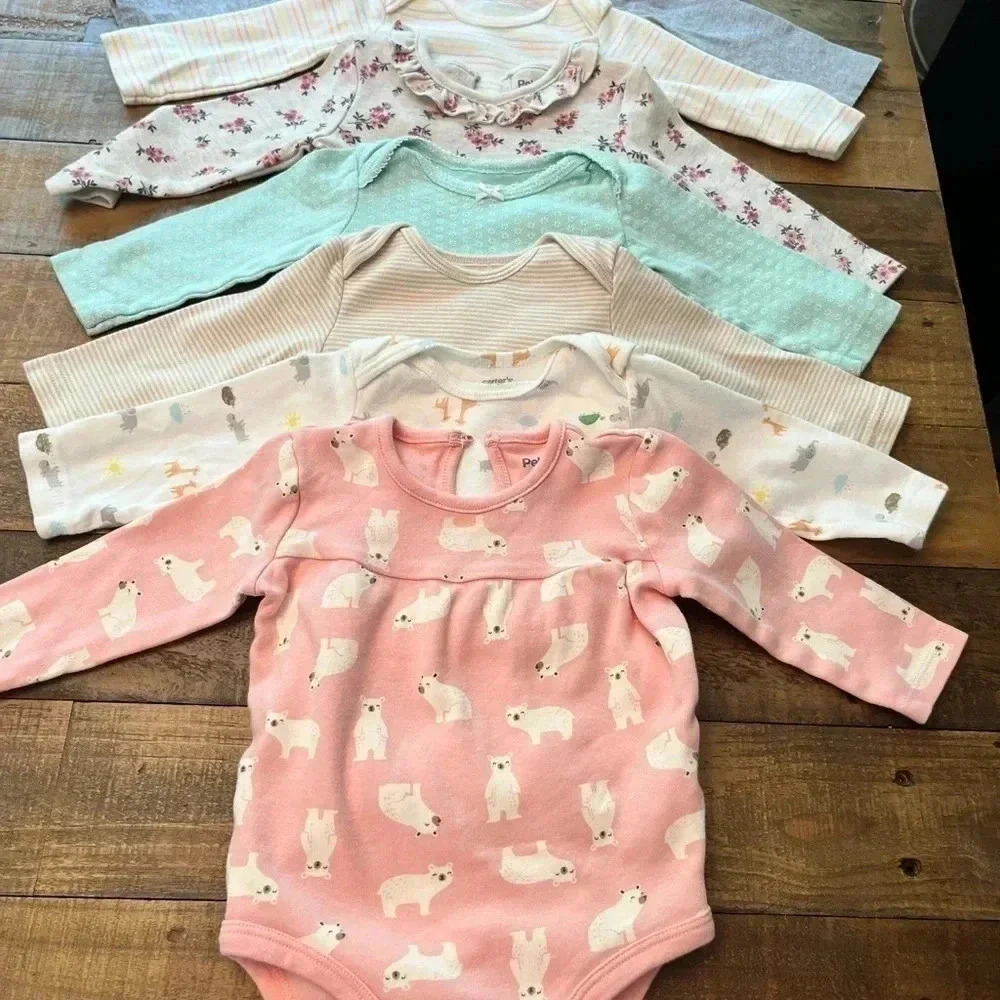 Bundle of Seven Long Sleeved Onesies